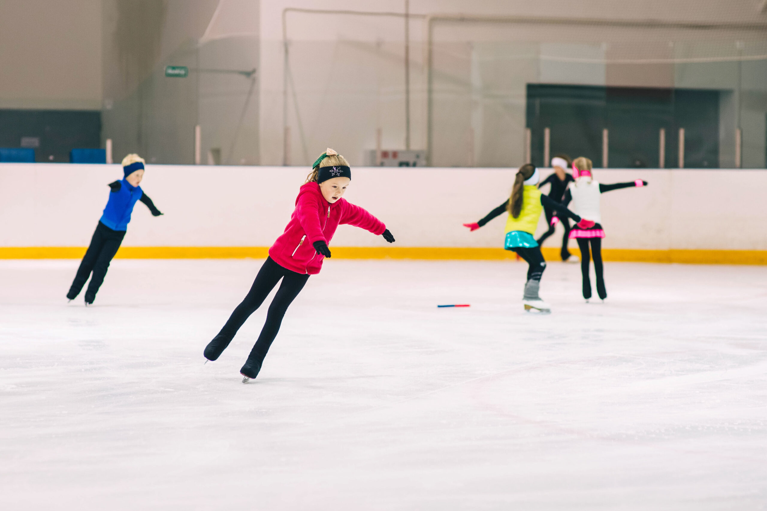 young kids learning skating skills