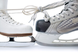 figure skates tied to hockey skates